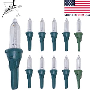 May include: Ten clear Christmas light bulbs with green plastic bases. The bulbs are designed to be used on a string of Christmas lights.