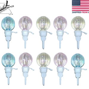 May include: A collection of ten decorative globe lights with a ribbed texture. The globes are in various colors, including blue, pink, and yellow, and are attached to white bases. These lights are ideal for garden or patio decor.