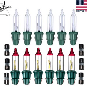 May include: Set of 10 clear Christmas lights with green bases and red tips. The lights come with 4 spare fuses.