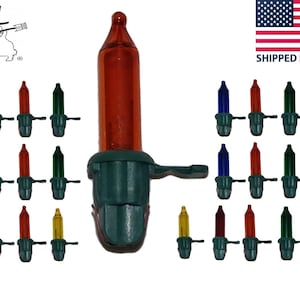 May include: A selection of colourful mini Christmas light bulbs. The bulbs are in various colours, including yellow, red, green, and blue. The bulbs have a classic teardrop shape and are attached to green bases.