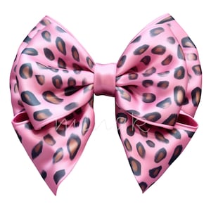 May include: A large pink bow with a leopard print pattern. The bow is made of satin and has a shiny finish.
