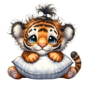 12 schattige baby tijger png-clipart met grote ogen, knot haar, liggend op kussen, schattig jungledier voor sublimatie