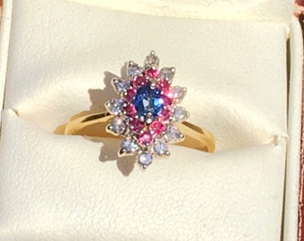 Beautiful Vintage 18 ct gold marquise ring set with sapphire rubies and diamonds would make a great engagement ring