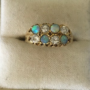 Vintage 18 carat gold black  Opal and brilliant cut diamond dress engagement ring