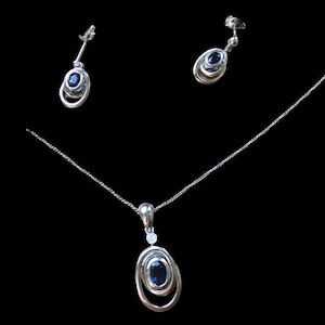 18 carat withe gold sapphire and diamond necklace earrings set