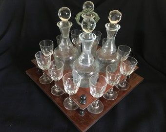 Antique rare liqueur tantalus set with glasses and decanters