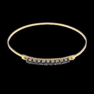 armband i guld och blått safir