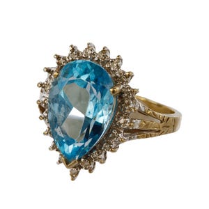 large blue topaz and diamond cluster ring