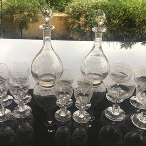French Antique crystal Champagne coupes red wine glasses and decanters