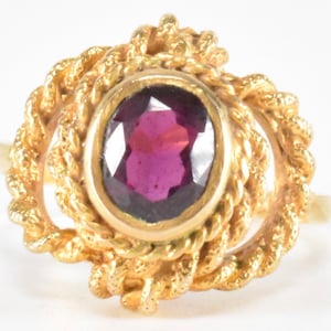 Vintage gold and red garnet ring with rope detail made in London UK 1964