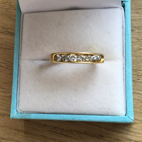 18 carat gold brilliant cut diamond half eternity ring