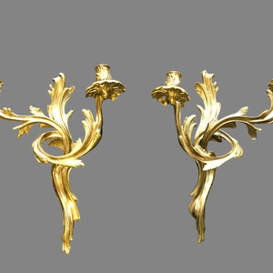 A pair of french antique ormolu sconces candle holders Louis XV style
