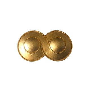 Vintage gold tone brooch by designer SPHYNX