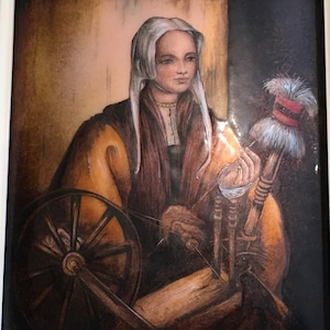 May include: A painting of a woman with long white hair, wearing a brown and yellow robe, sitting at a spinning wheel. The spinning wheel is made of wood and has a large wheel and a smaller spindle. The woman is holding a piece of yarn in her hand. The painting is set against a dark background.