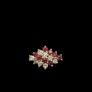 Vintage 18 carat gold ruby and diamond cluster ring