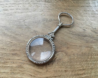 Vintage sterling silver quizzed magnifying glass pendant