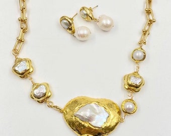 a unique gold plated large baroque pearl necklace and earring set