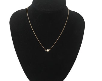 Vintage French 18 carat gold necklace set with 2 diamonds and a cultured pearl