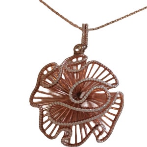 Few Lei cascade 18 carat rose gold vermeil on silver large necklace and earrings in original box.