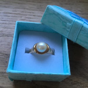 solid gold and pearl ring