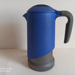 Quirky stovetop moka pot by Freddi casalinghi, made in Italy, stylish espresso maker, black and blue coffee pot
