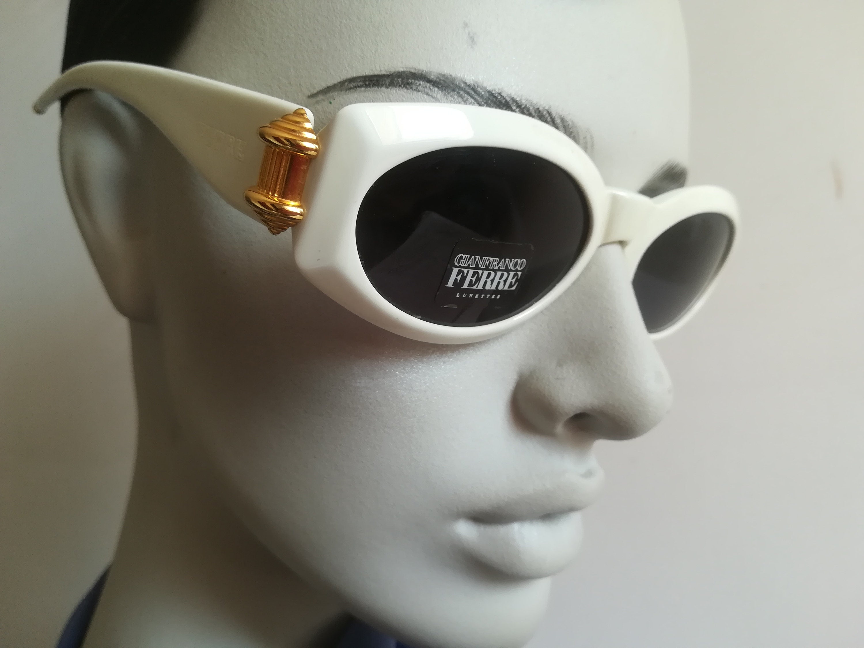 GIANFRANCO FERRE vintage pair of designer sunglasses made in Italy, ivory with golden details.