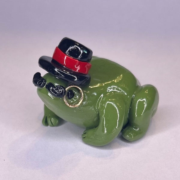 Gentleman frog figurine