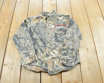Camisa vintage de los años 90 de Mossy Oak Apparel con estampado de camuflaje de árboles y botones, talla M para jóvenes / Camisa vintage con botones / Caza / Aire libre