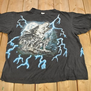 Camiseta gráfica vintage de los años 90 con lobos aulladores de American Thunder, costura simple, estampado integral, camiseta con relámpagos y amanecer