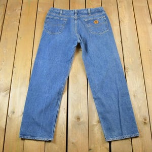 Vintage 1990s Carhartt Denim Work Jeans Size 38 x 32 / 90s Carpenter Pants / Made In USA / Distressed Carhartt / Vintage Workwear