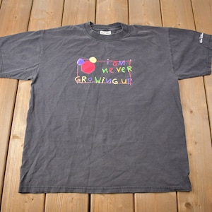 1990年代のヴィンテージ「I Am Never Growing Up」ディズニーTシャツ / 90年代グラフィックTシャツ / ヴィンテージミッキーマウス / ウォルトディズニーワールド