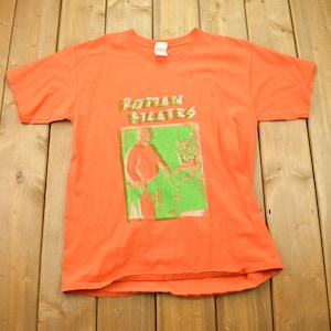 Vintage 1990s Roman Pilates Graphic T-Shirt / Orange Tee / 80s / 90s / Streetwear Fashion / Vintage Graphic Tee