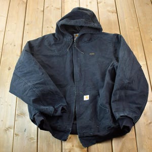 Vintage 1990s Distressed Carhartt Heavy Canvas Ed M Feld Eq Co Carroll Iowa Hooded Jacket Made In USA