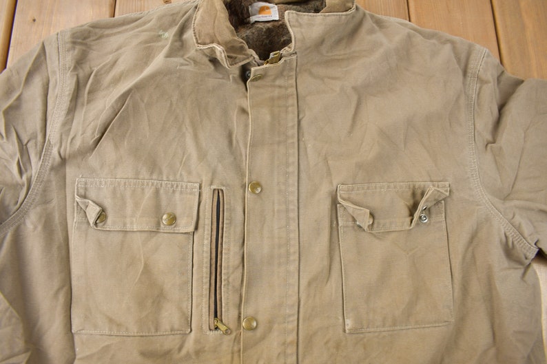 Vintage 1990s angustiado Carhartt manta forrada chaqueta de campo hecha en EE.UU. tamaño XXL imagen 7