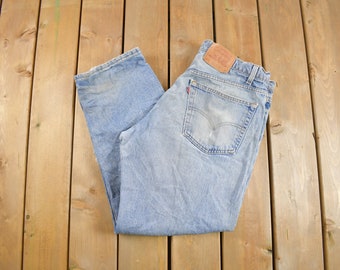 Vintage 1990s Levi's 565 Red Tab Denim Jeans Size 38 x 30 / Blue / Light Wash / Vintage Denim  / Made In USA / 90s Levi's / Distressed