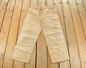 Vintage 1990s Carhartt Distressed Sun Faded Double Knee Pants Men's 34 x 29 / 90s Carpenter Pants / Workwear / Dungarees