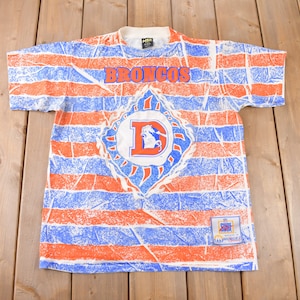 Vintage 1990s Denver Broncos NFL Football All Over Print Graphic T-Shirt Made In USA