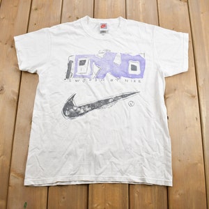 Vintage 1990s Nike Swoosh Youth Size Graphic T-Shirt / 90s / Vintage Streetwear / Graphic T Shirt / Vintage Nike Grey Tag