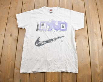 Vintage 1990s Nike Swoosh Youth Size Graphic T-Shirt / 90s / Vintage Streetwear / Graphic T Shirt / Vintage Nike Grey Tag