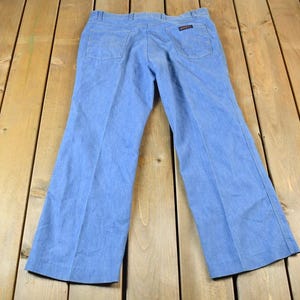 Vintage jaren 1970 Levis Action broek blauwe broek maat 35 x 30 / comfortabele broek / streetwear / vintage broek / broek wijde pijpen