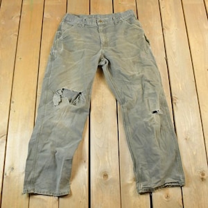 Vintage 1990s Carhartt Denim Work Jeans Size 34 x 32 / 90s Carpenter Pants / Made In USA / Distressed Carhartt / Vintage Workwear