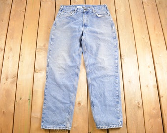 Vintage 1990s Carhartt Plaid Lined Work Jeans Size 35 x 30.5 / 90s Carhartt / Light Wash / Distressed Carhartt / Vintage 90s Workwear