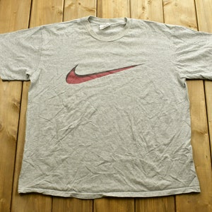 Vintage 1990s Nike Middle Swoosh Graphic T-Shirt / 90s / Streetwear / Vintage Athleisure / Brand and  Logo / 90&#39;s Nike / Made In USA