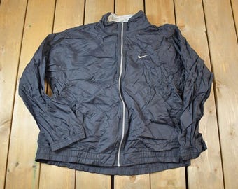 Vintage 1990s Nike Hidden Pocket Windbreaker Jacket