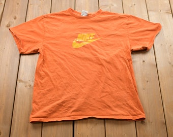 Vintage 1990s Nike Swoosh Graphic T-Shirt / 90s / Streetwear / Vintage Athleisure / Made In Canada / 90's Nike / Nike Graphic Tee