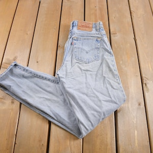 Vintage 1990s Levi&#39;s 550 Light Wash Jeans Size 28 x 31 / Relaxed Fit / Tapered Leg / Vintage Levi&#39;s
