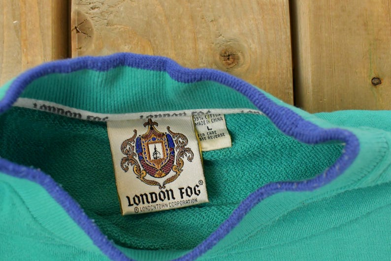 May include: A set of three ceramic mugs with a speckled, matte finish. The mugs are in shades of cream, light gray, and dark gray. Each mug has a simple, minimalist design, perfect for coffee or tea.