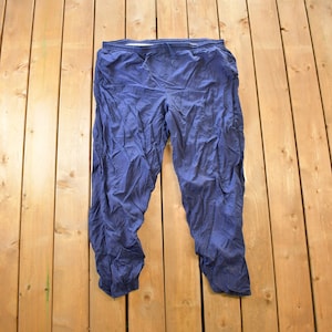 Vintage 1990s Nike Mini Swoosh Track Pants Size XL / Athletic Pants / Nike Jogger Pants / American Vintage / Streetwear