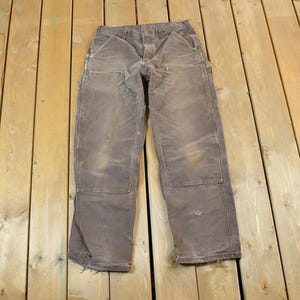 Vintage 1990s Carhartt Double Knee Riveted Denim Work Pants Size 32 x 32 / 90s Carpenter Pants / Made In USA / Distressed Carhartt