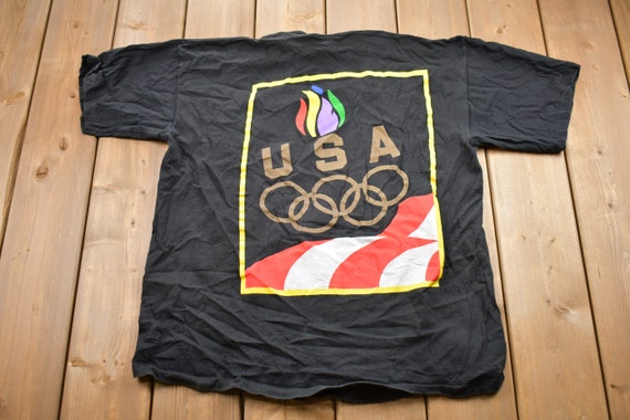 Vintage 1990s USA Olympics JC Penney Graphic T-shirt Vintage 1990s USA Olympics JC Penney Graphic T-shirt